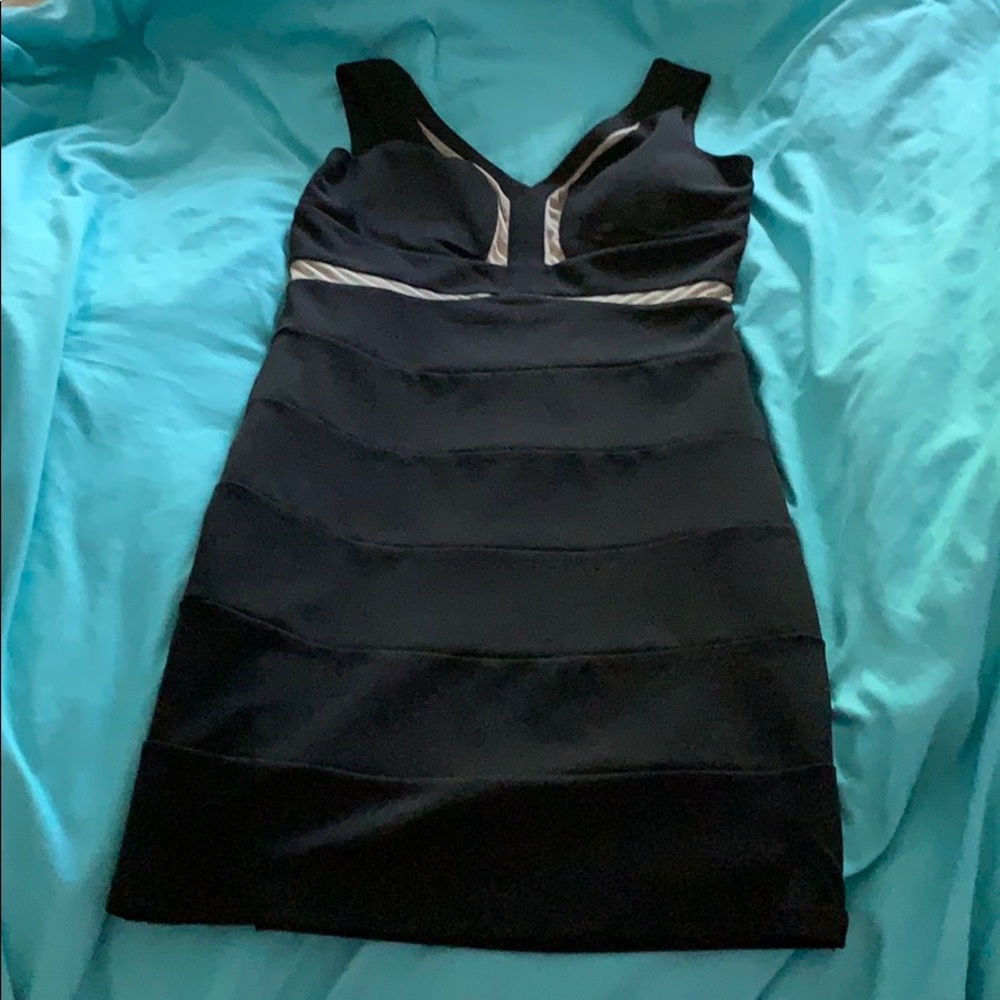 Black mini dress with nude mesh accents